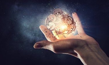 Dişli mekanizması elinde. Karışık teknik