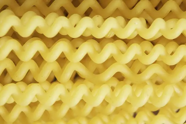 Uncooked spaghetti on table — Stock Photo, Image