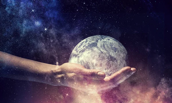 Whole world in hands. Mixed media — Stock Photo, Image