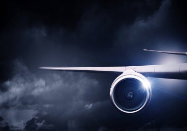 Uçağın gökyüzünde kapatın. Karma ortam. Karışık teknik