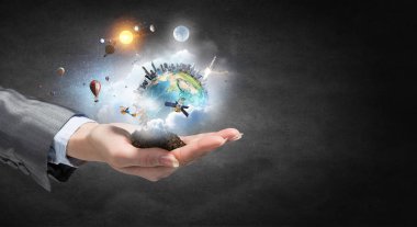 Bizim ellerde Dünya gezegeni. Karışık teknik