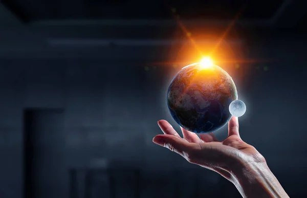 Whole world in hands. Mixed media — Stock Photo, Image