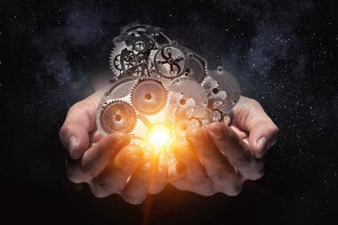 Dişli mekanizması elinde. Karışık teknik