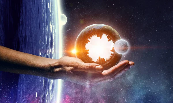 Whole world in hands. Mixed media — Stock Photo, Image