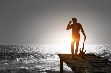 Gitar rock adam. Karışık teknik