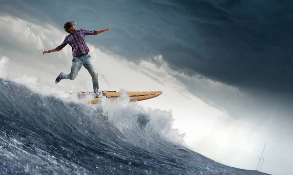 Surfing big waves. Mixed media — Stock Photo, Image