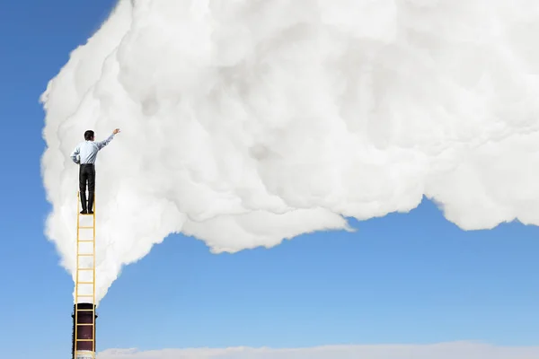 Businessman on ladder — Stock Photo, Image