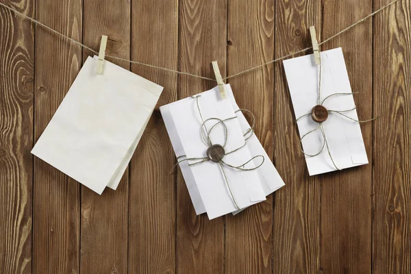 Envelopes pinned to rope — kuvapankkivalokuva
