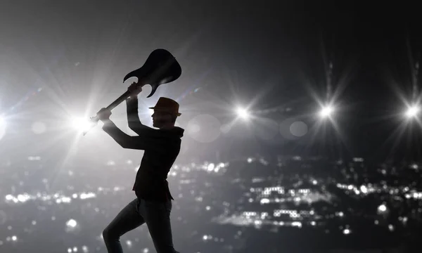 Un tipo de rock con guitarra. Medios mixtos —  Fotos de Stock