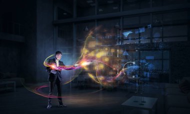 Sihirli gösteren iş adamı. Karışık teknik