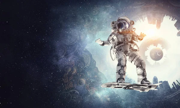 Spaceman on flying board. Mixed media — Stock Photo, Image