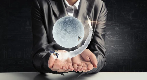 Moon planet in palms — Stock Photo, Image