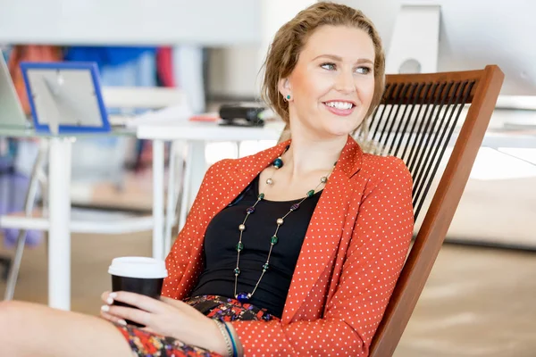 Young woman in office — Stock Photo, Image