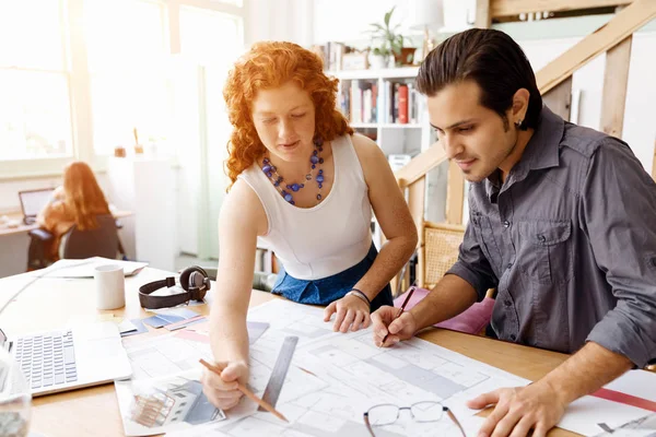 Two young architects in office — Stock Photo, Image