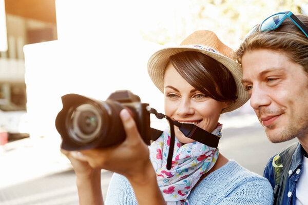 Smiling couple with the camera