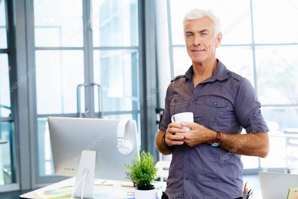 Handsome businessman in office