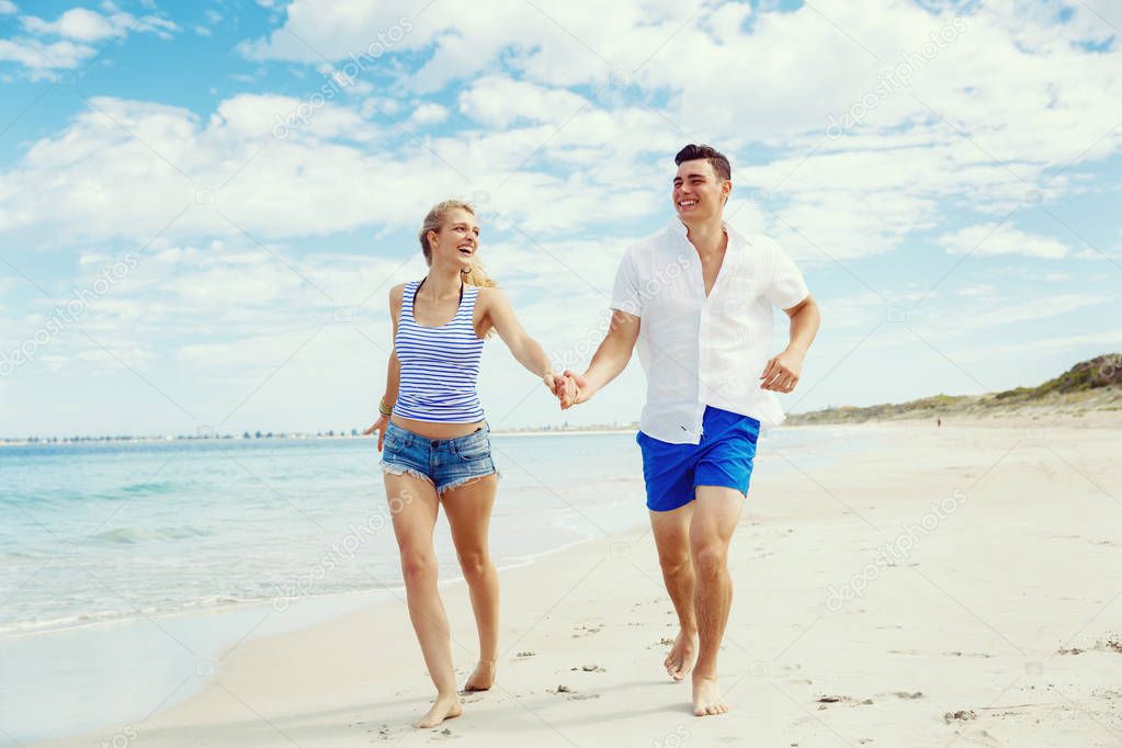 Romantic young couple on the beach