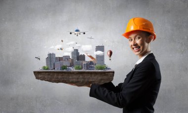 Kadın sunan inşaat projesi. Karışık teknik