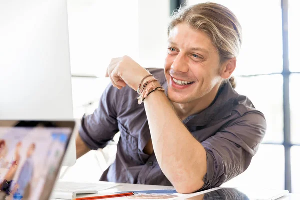 Happy young man designer working — Stock Photo, Image
