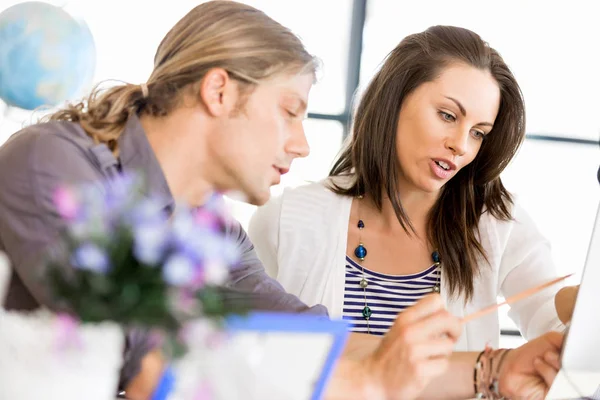 Image of two young business people in office — Stock Photo, Image