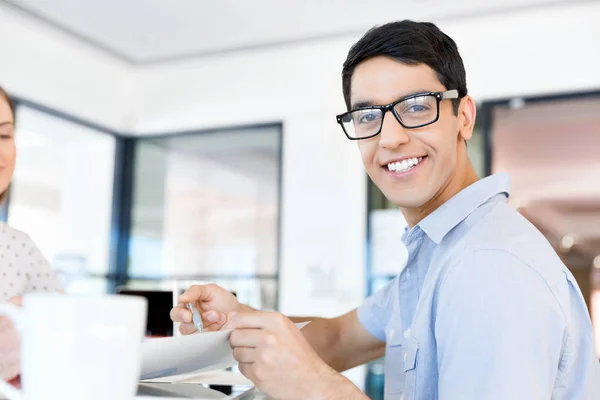 Young man in casual in office — Stock Photo, Image