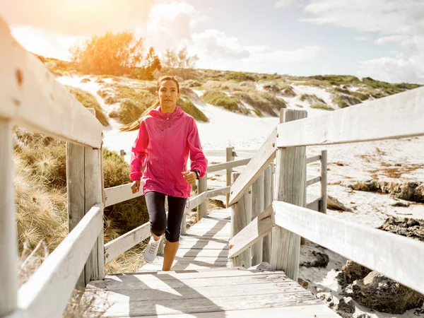 Young Woman Jogging On The Beach — Stock Photo, Image
