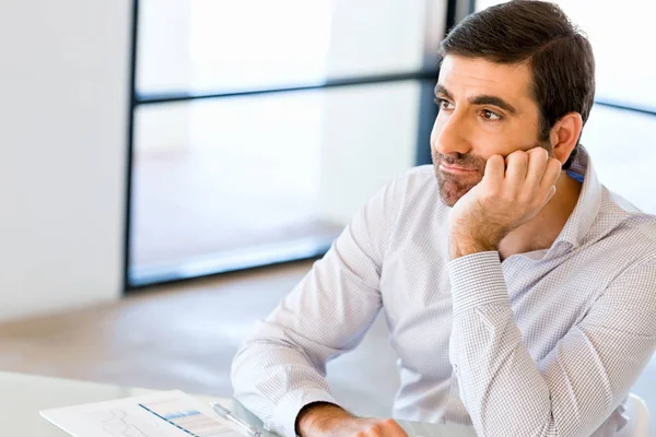 Pensive businessman at office — Stock Photo, Image