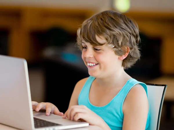 Little boy with laptop Royalty Free Stock Photos