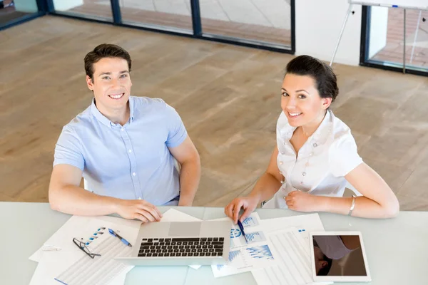 Image of two young business people in office — Stock Photo, Image