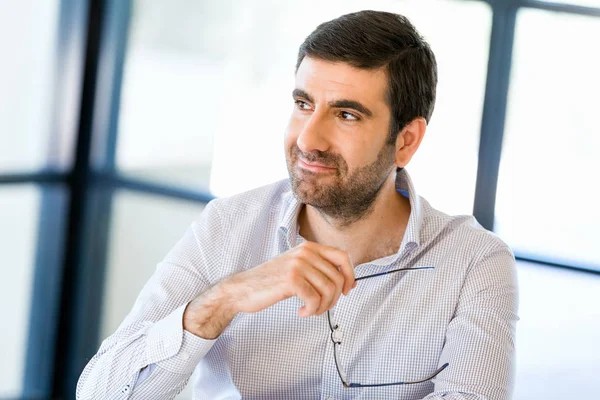 Pensive businessman at office — Stock Photo, Image