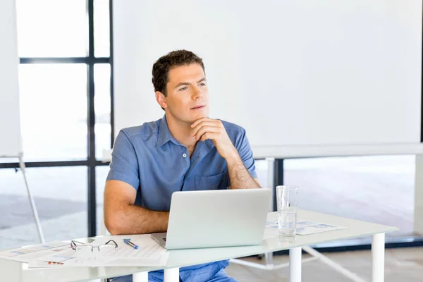 Pensive businessman at office — Stock Photo, Image