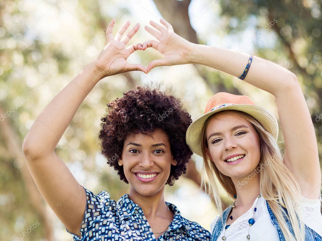 Two women friends in park