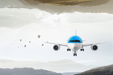 Uçak gökyüzünde. Karışık teknik