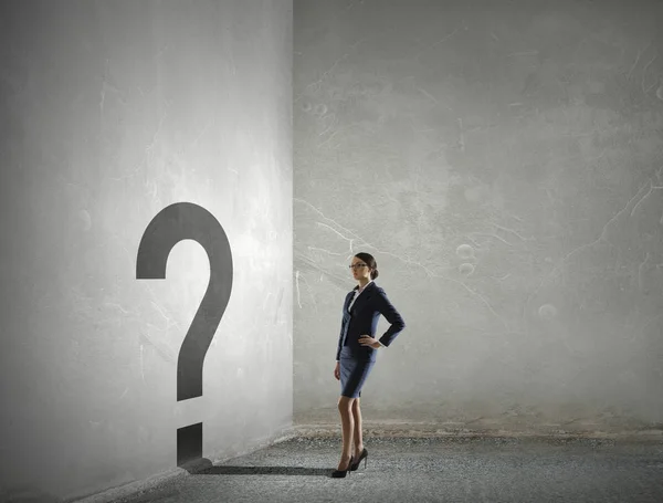 Businesswoman in empty room . Mixed media — Stock Photo, Image