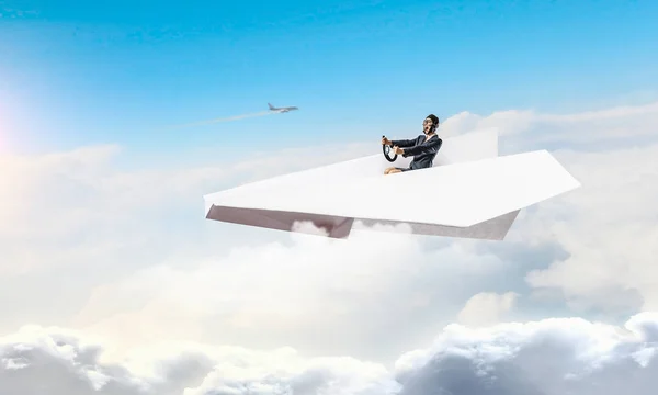 Aviador en avión de papel. Medios mixtos — Foto de Stock