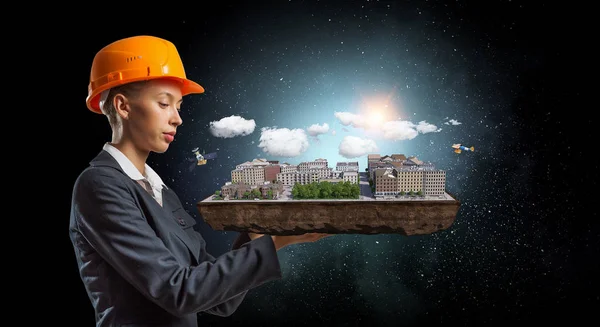 Kadın sunan inşaat projesi. Karışık teknik