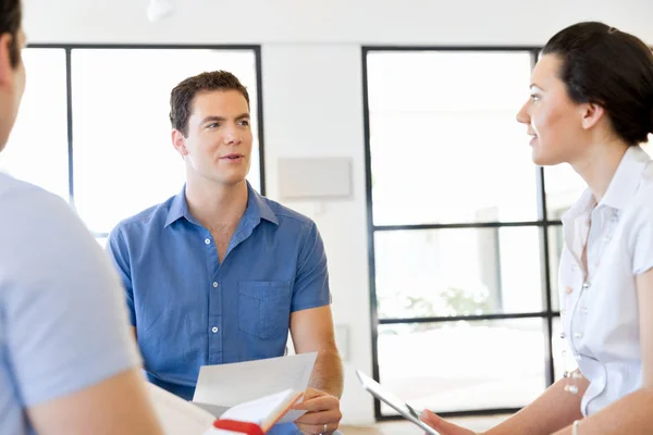 Image of business partners discussing documents and ideas — Stock Photo, Image