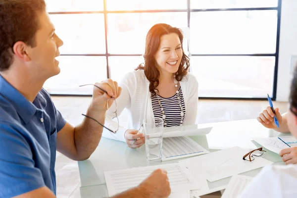 Image of business partners discussing documents and ideas — Stock Photo, Image