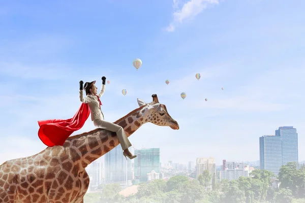Meisje zadel giraffe. Mixed media — Stockfoto
