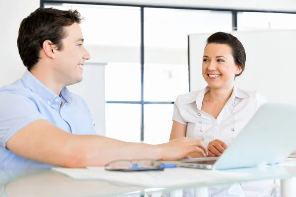 Image of two young business people in office — Stock Photo, Image