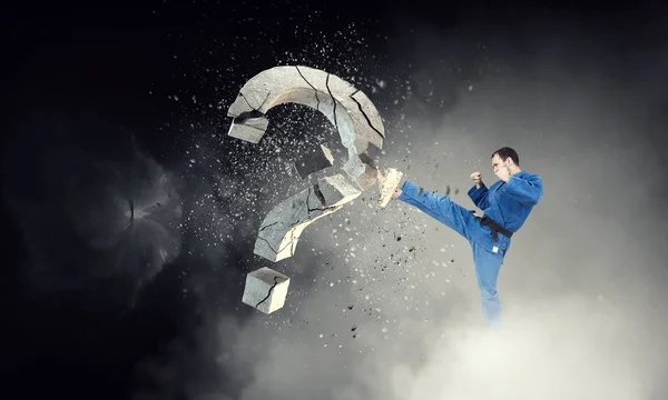 Karate man w akcji. Techniki mieszane — Zdjęcie stockowe