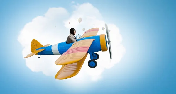 Man flying in retro plane. Mixed media — Stock Photo, Image