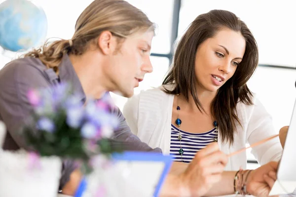 Image of two young business people in office — Stock Photo, Image