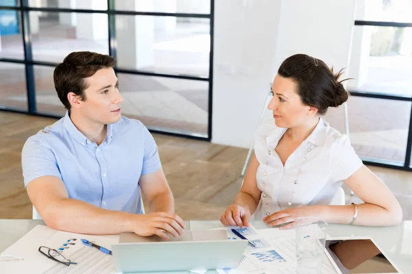 Image of two young business people in office — Stock Photo, Image