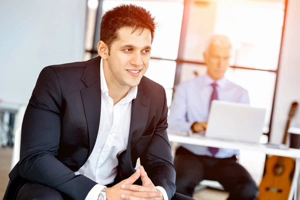 Businessman at the office Stock Image