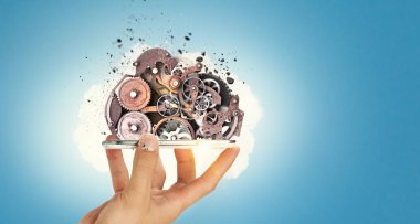 Dişli mekanizması elinde. Karışık teknik