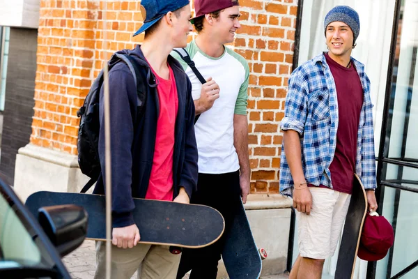 Teenage friends walking at the street — Stock Photo, Image