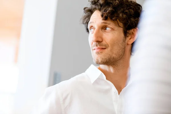 Portrait of a smart young man indoors — Stock Photo, Image