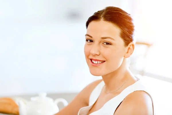 Portrait of young woman indoors — Stock Photo, Image