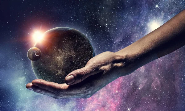 Whole world in hands. Mixed media — Stock Photo, Image